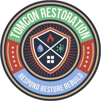 A badge that says tomcon restoration.