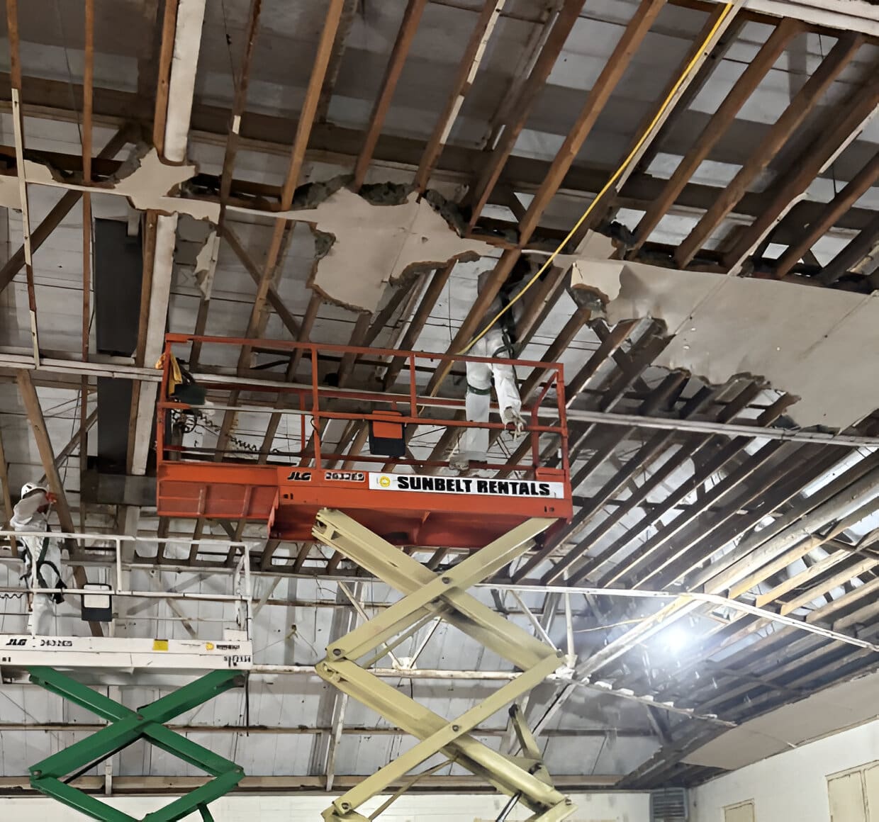 A building with some scaffolding on the ceiling